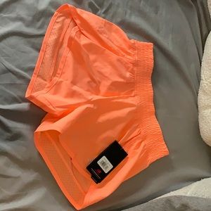 Bright coral 3 inch workout shorts